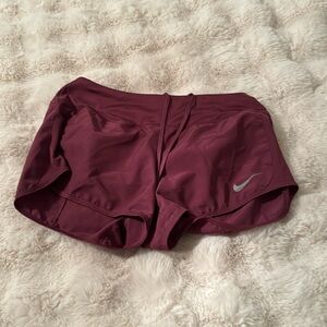 Size small. Low rise. Worn down some but good condition